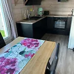 Log By The Villa